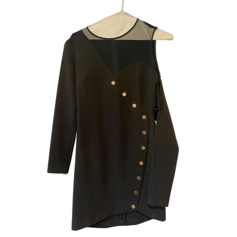 Elegant, unique LBD with cold shoulder and asymmetrical gold buttons.